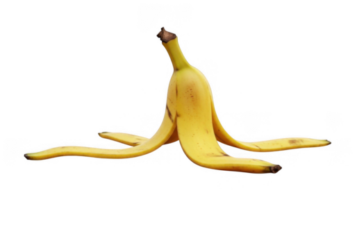 Banana peel isolated on transparent background, a discarded skin of a ripe yellow fruit, lying flat with its curved segments spread out, contrasting against the clean backdrop