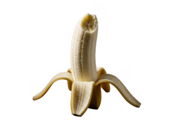 Closeup of a peeled banana with a bite taken out of it, showing the white flesh and the yellow peel, isolated on transparent background