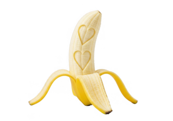 A peeled banana with two carved hearts, symbolizing love and affection, isolated on transparent background perfect for valentines day or a romantic gesture