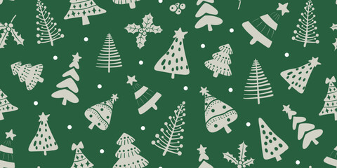 Christmas seamless pattern with cute Christmas trees and festive decorations on a green background.