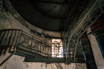 Obraz premium Inside the Historic Water Tower with Riveted Steel Tank, Spiral Staircase, Preserved Industrial Heritage in Komarno, Komarom, Slovakia