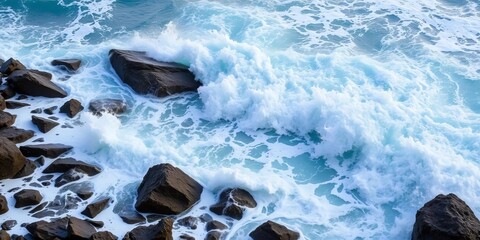 Powerful ocean waves crashing on a rocky shore, white water churning,  force,  texture