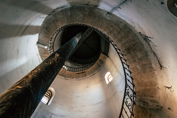 Fototapeta premium Inside the Historic Water Tower with Riveted Steel Tank, Spiral Staircase, Preserved Industrial Heritage in Komarno, Komarom, Slovakia