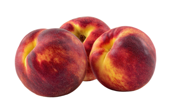 Three ripe peaches clustered close together, displaying a gradient of red and yellow hues