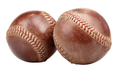 Two aged baseballs, close-up.  Leather, stitched seams, a rich brown hue