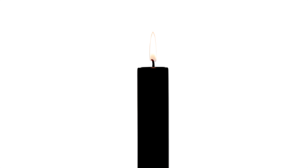 A single black wax candle with a small flame isolated on transparent background is burning in the darkness