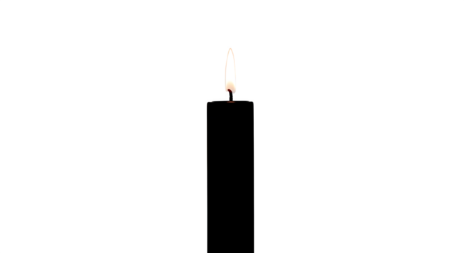 A single black wax candle with a small flame isolated on transparent background is burning in the darkness
