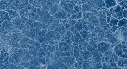 Intricate ice patterns create a mesmerizing blue abstract texture