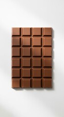 Irresistible milk chocolate bar isolated on white background, a sweet temptation