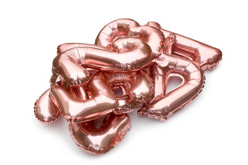 On a white background there is a pile of inflatable pink number balloons.
