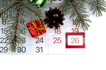 The calendar is marked December 26th, Christmas.	