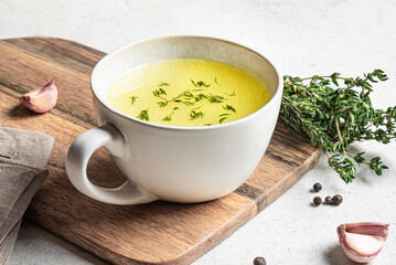 Chicken bone broth in mug