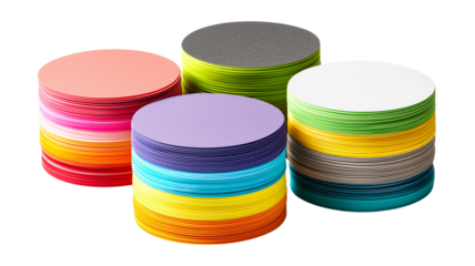 Colorful stacks of round paper on a pristine background, showcasing vibrant hues for creative design projects.