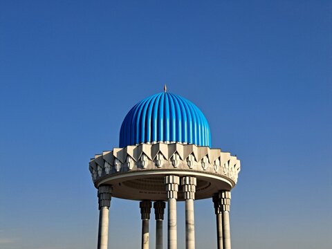 Sunlit Dome of the Memorial to the Victims of Repression against Clear Blue Sky in Tashkent, Uzbekistan