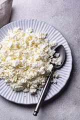 Cottage cheese on light background