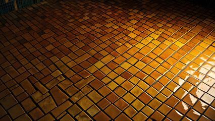 Dramatic Lighting on Worn Black Ivory Rounded Tiles, Historical Elegance - mosaic floor texture