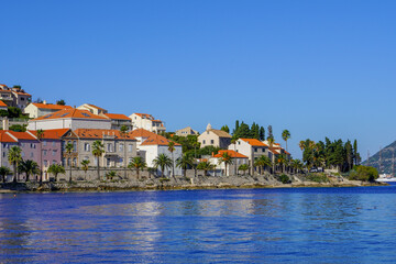 Seafront view at beautiful Korcula town in summertime, touristic place in Southern Croatia, Europe Mediterranean.