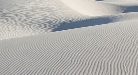 White sand dunes with ripple patterns a minimalist landscape perfect for travel and nature backgrounds