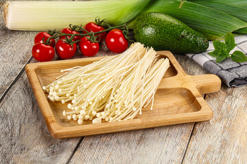 Raw enoki mushroom for cooking
