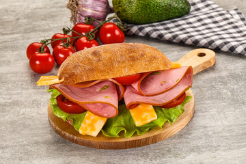 Sandwich ciabatta with mortadella and cheese