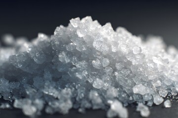 Macro shot of coarse sea salt crystals sparkling under light
