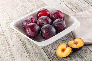 Ripe sweet juicy plum heap