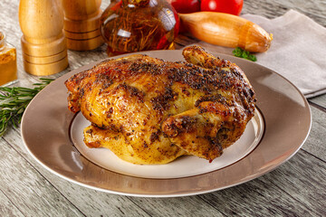 Baked in oven whole chicken with spices