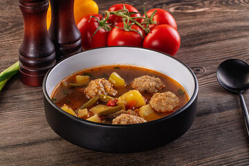 Tomato Soup with meatballs and vegetables