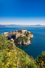 Fototapeta premium Gaeta, Latina, Lazio, Italy. A splendid view of the city from the top of Monte Orlando. The imposing Angevin-Aragonese castle dominates the ancient village overlooking the sea from the clifftop.