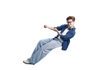 Young Man in Dynamic Pose: A young man embodies energy, joy, and drive, pulling an invisible rope in a studio setting. Captured against a clear backdrop.