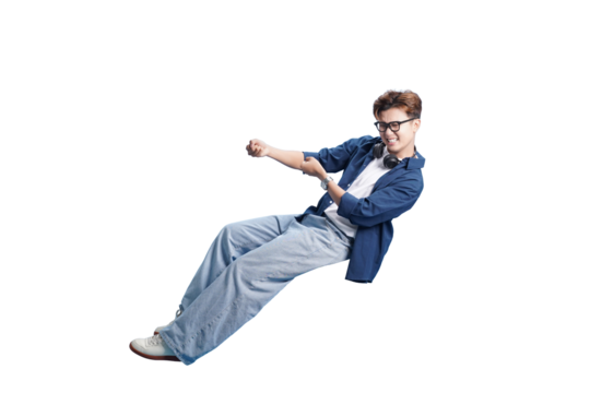 Young Man in Dynamic Pose: A young man embodies energy, joy, and drive, pulling an invisible rope in a studio setting. Captured against a clear backdrop.