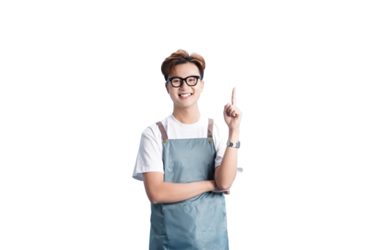 Smiling Barista: A young, cheerful barista, smartly dressed in an apron and glasses, points upward, exuding a welcoming and helpful demeanor.