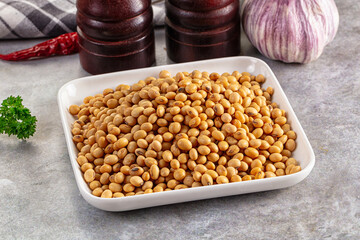 Raw dry soya beans heap
