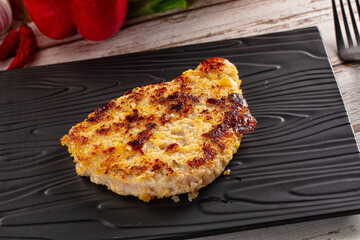 Breaded crispy chicken schnitzel