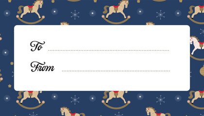 Christmas gift tag with “To” and “From” fields on white label over dark blue background with rocking horses, snowflakes, and stars.