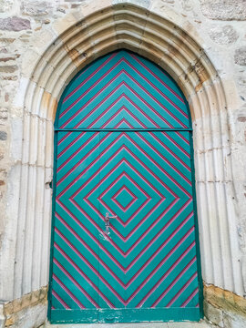 Old wooden door with colourful paint