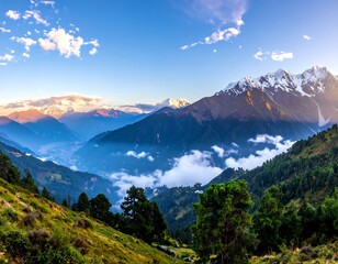 A scenic vista of mountainous terrain bathed in the warm light of sunrise, creating dramatic shadows and highlighting snow-capped peaks