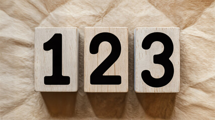 Wooden blocks displaying numbers one two and three on a textured background ideal for educational resources counting exercises and early childhood learning materials for kids and toddlers