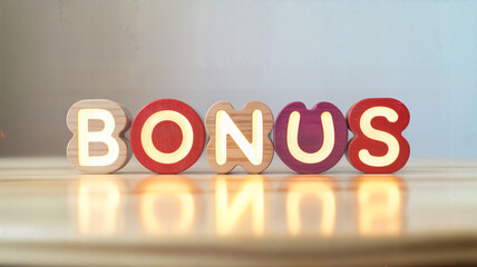 Colorful wooden blocks spelling "bonus" create a bright and cheerful message perfect for motivational content promotional materials or educational resources with a positive and playful vibe