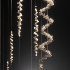 Elegant strands of shimmering crystals hang gracefully in a dark setting, creating a captivating visual display