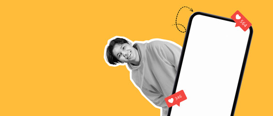 A cheerful individual stands beside a large smartphone, smiling as they interact with social media notifications. The vibrant yellow backdrop enhances the fun atmosphere and youthful energy.