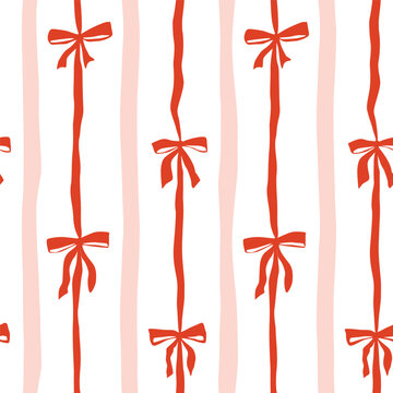 Read and pink striped Christmas bows seamless pattern. Winter holiday festive decoration, girls party design. Whimsical hand drawn bow knots. Cute vector repeat background, textile, wrap paper, print