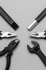 Essential automotive tools displayed on a gray surface showcasing their importance in vehicle maintenance and repair tasks