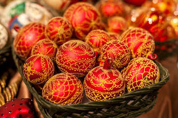 New York City, New York. USA  Multiple red and gold Christmas ball ornaments. 