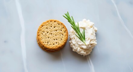 Organic oat crackers topped with almond cheese for healthy vegan snack and mindful eating inspiration