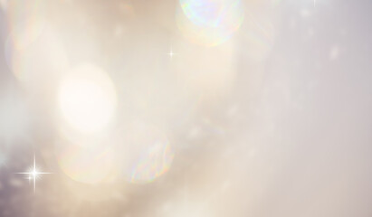 Christmas glowing Background. New year abstract glittering blurred backdrop with blinking stars and sparks. Xmas Bokeh.