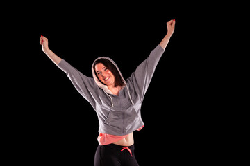 Young casual Woman next to a blackboard