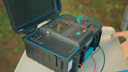 Advanced testing device set up for electrical diagnostics in a field environment during daytime