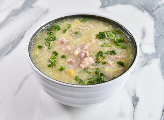 Comforting bowl of chicken and corn soup, a culinary delight perfect for a nourishing lunch or dinner. A tasty and balanced meal option.