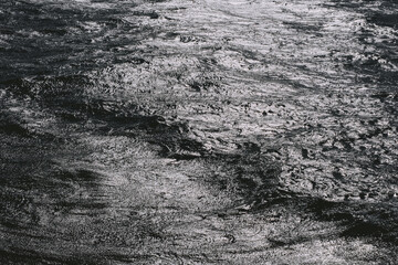 Dramatic monochrome ocean waves captured in motion